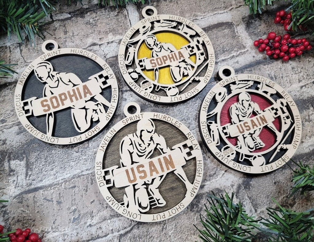 Track and field Christmas ornaments.