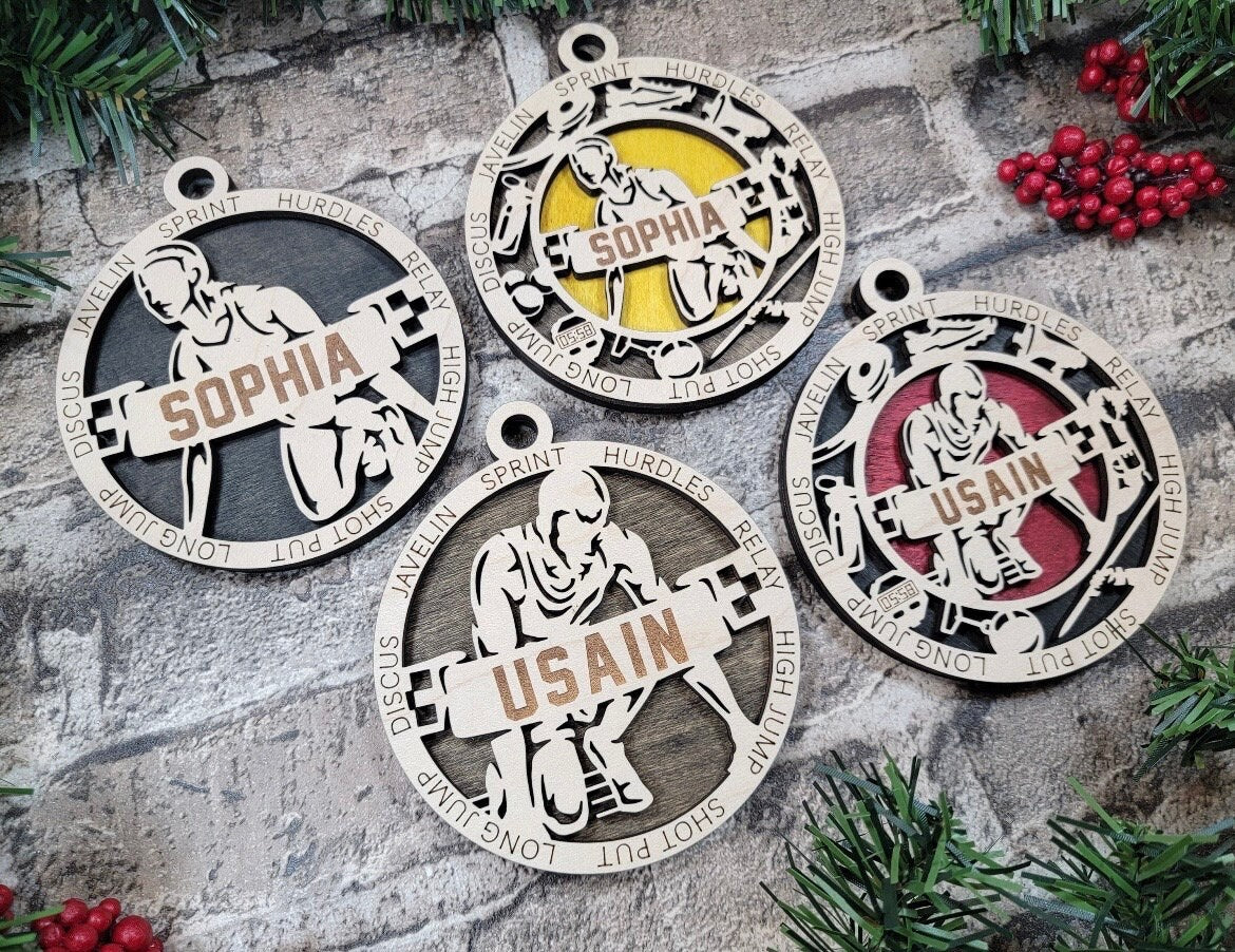 Track and field Christmas ornaments.