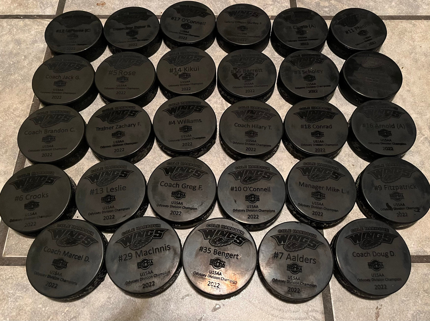 Custom Engraved team set of hockey pucks (players only)