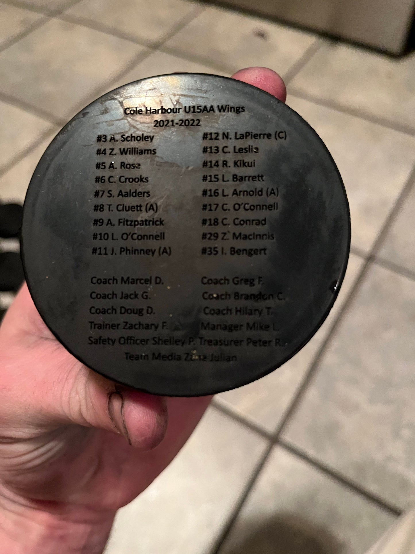 Custom Engraved hockey pucks (full team and coaches)