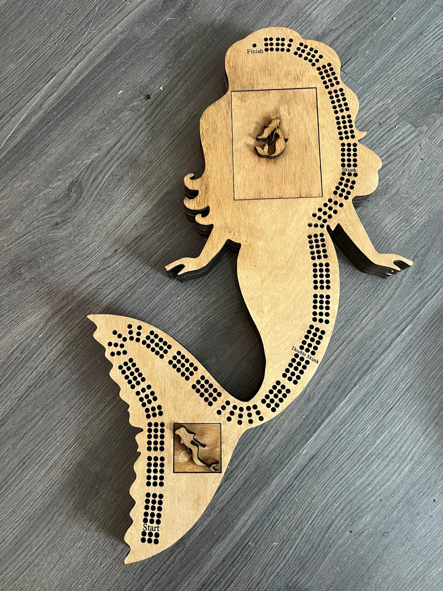 Mermaid shaped cribbage board
